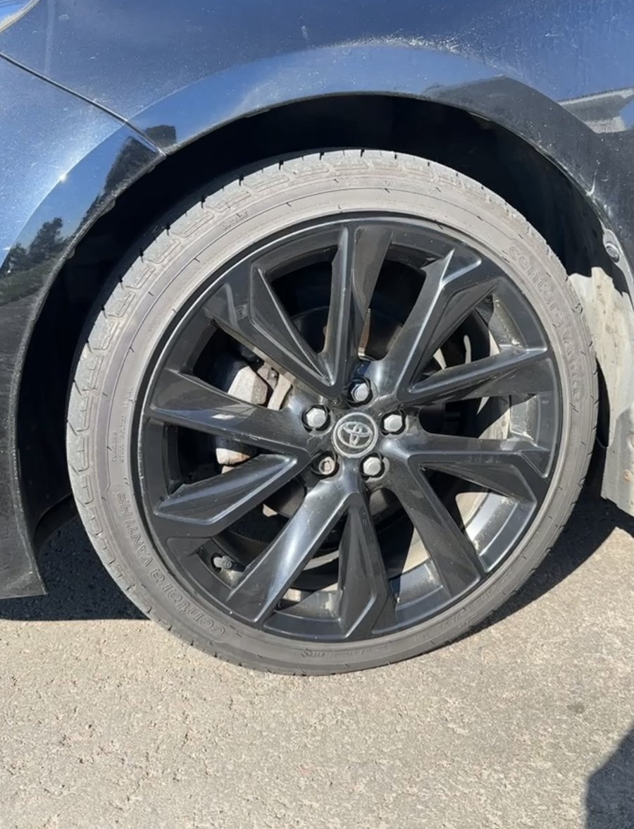 Dirty wheel with grime before a wheel detail