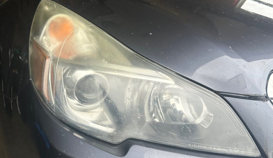 Hazy, oxidized headlight before restoration