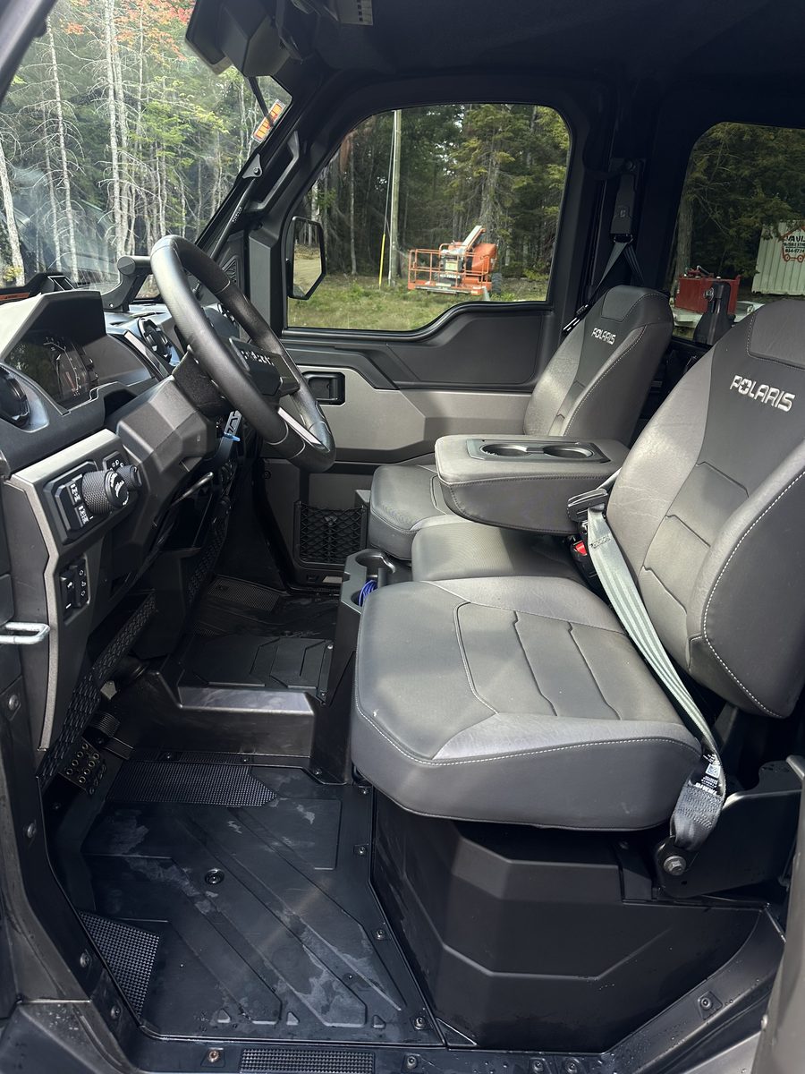 Clean side-by-side cab interior after detailing