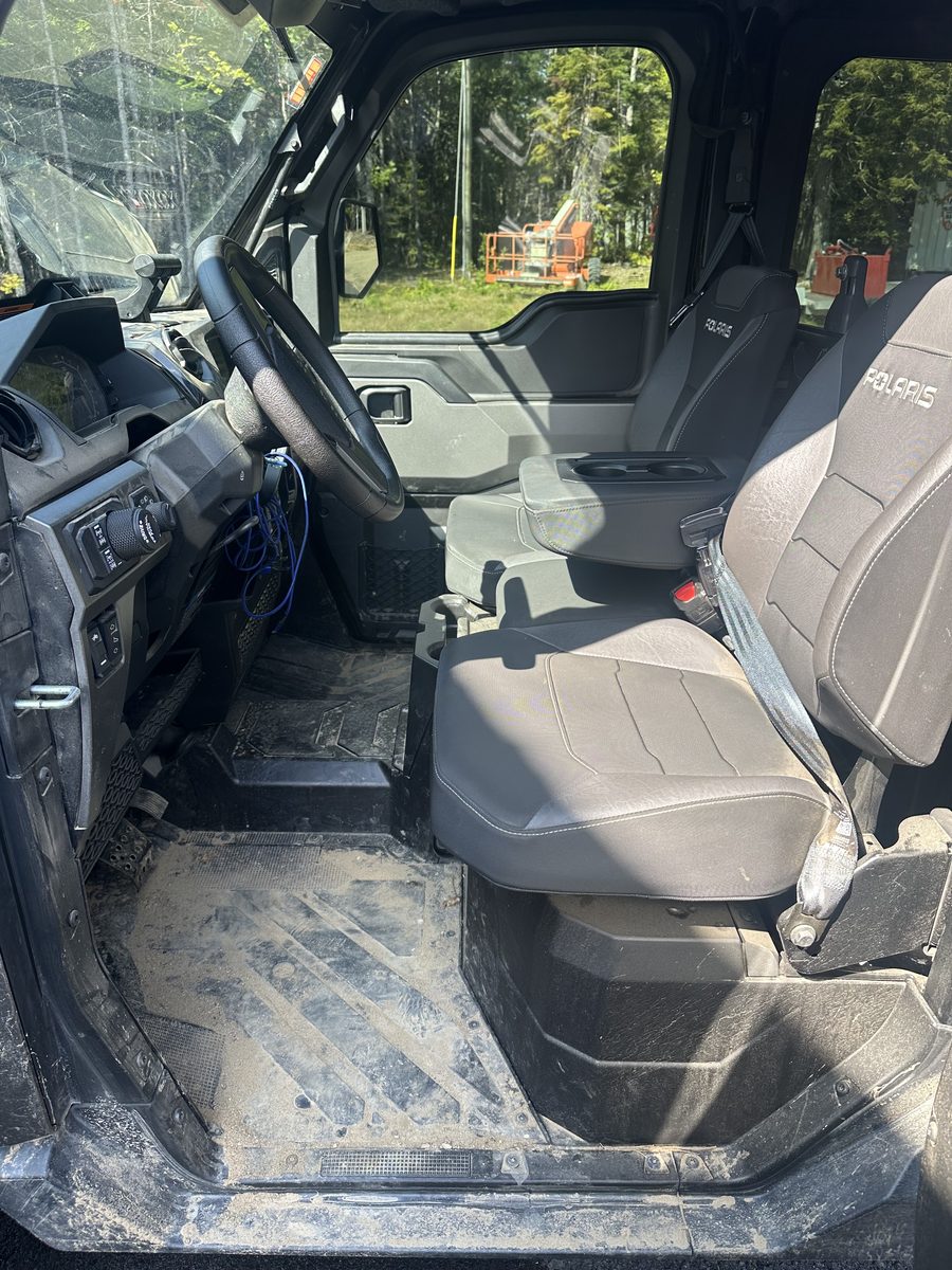 Dusty side-by-side cab interior before detailing